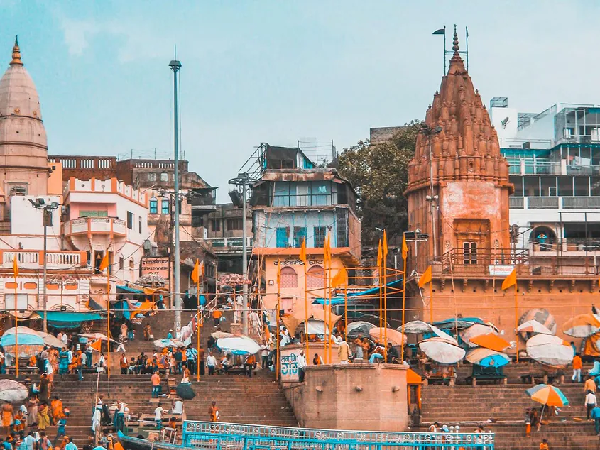 Rugs being washed and dried along the Ganges riverbank